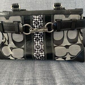 Coach black pocket book and wallet